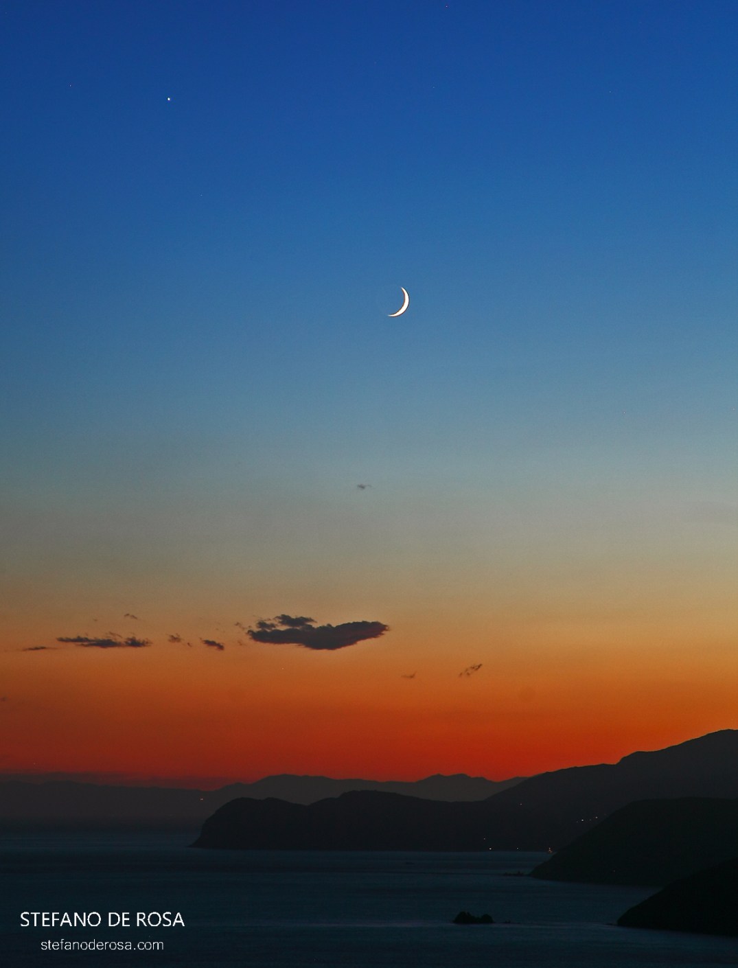 Moon and Jupiter over Isola d'Elba
